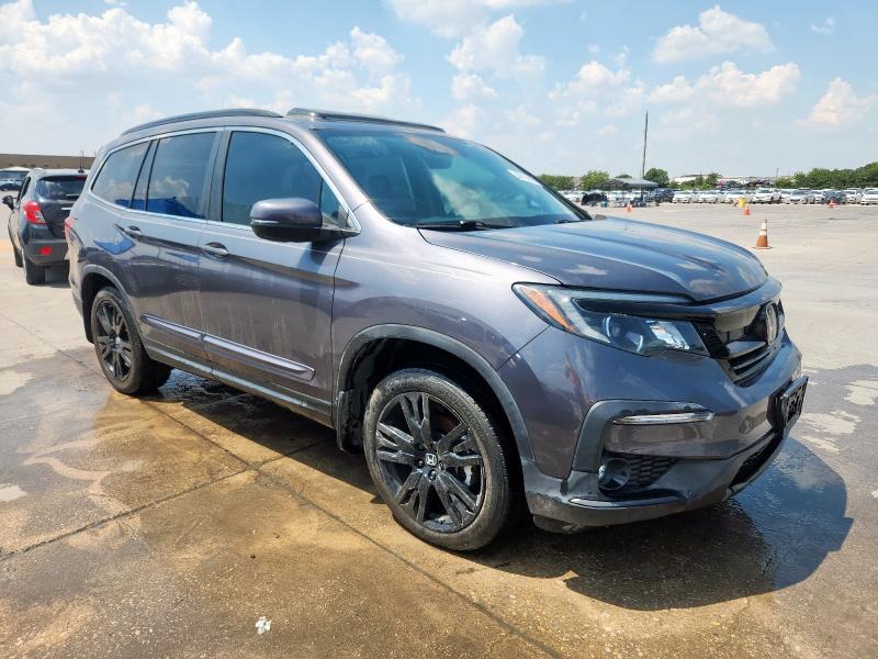 Photo 4 from auction – 2022 HONDA PILOT SE with VIN 5FNYF5H2XNB001203