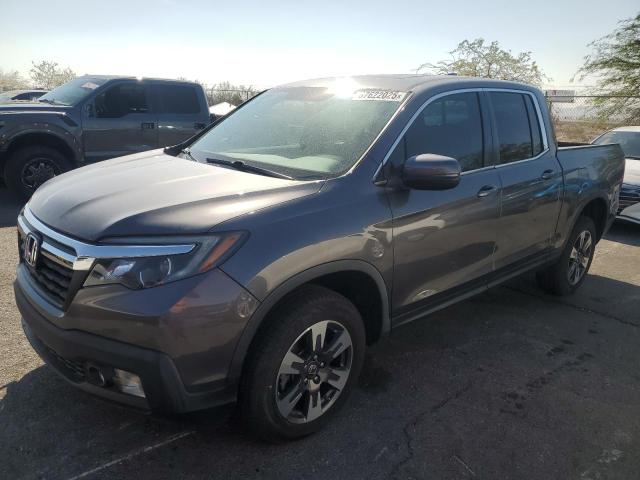 HONDA RIDGELINE 2019 with VIN 5FPYK3F62KB017596 - Photo from auction