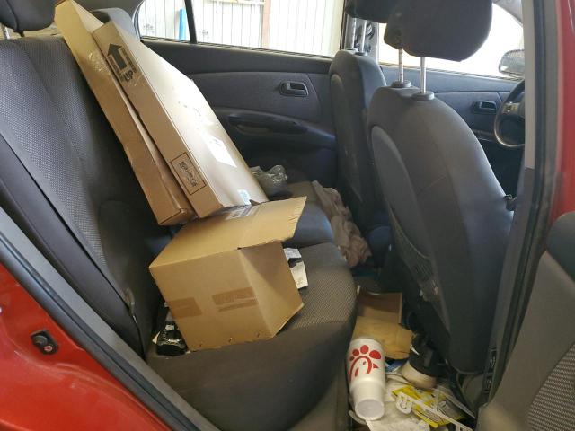 Photo 10 from auction – 2011 KIA RIO BASE with VIN KNADH4A35B6911268