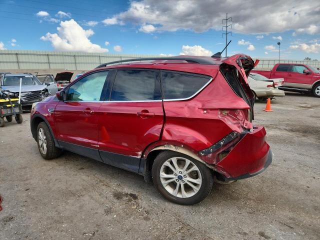 Photo 2 from auction – 2018 FORD ESCAPE with VIN 1FMCU9GD8JUA55610