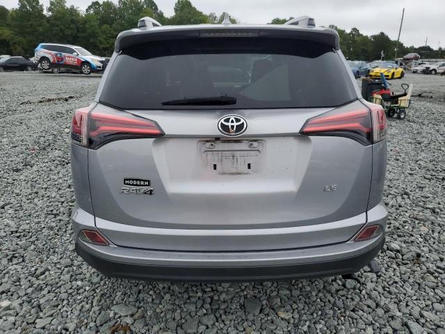 Photo 6 from auction – 2018 TOYOTA RAV4 LE with VIN JTMZFREV4JD114088