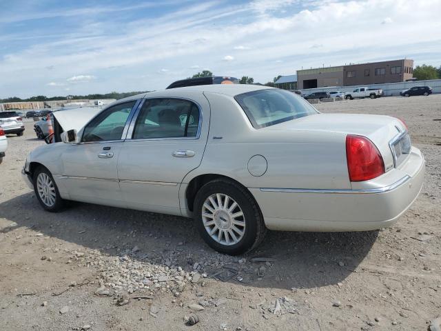 Photo 2 from auction – 2004 LINCOLN TOWN CAR ULTIMATE with VIN 1LNHM83W64Y659743