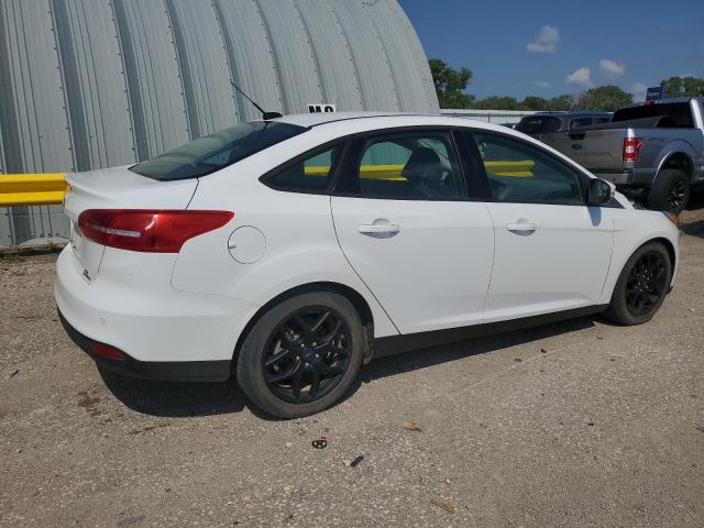 Photo 3 from auction – 2016 FORD FOCUS SE with VIN 1FADP3F22GL259658