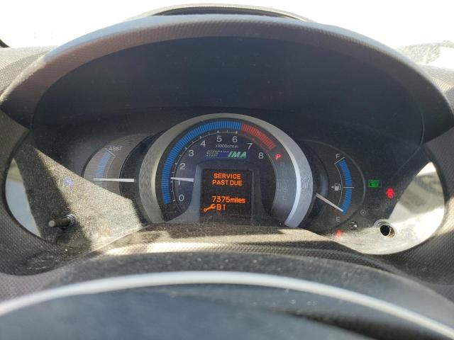 Photo 9 from auction – 2011 HONDA INSIGHT LX with VIN JHMZE2H51BS011695