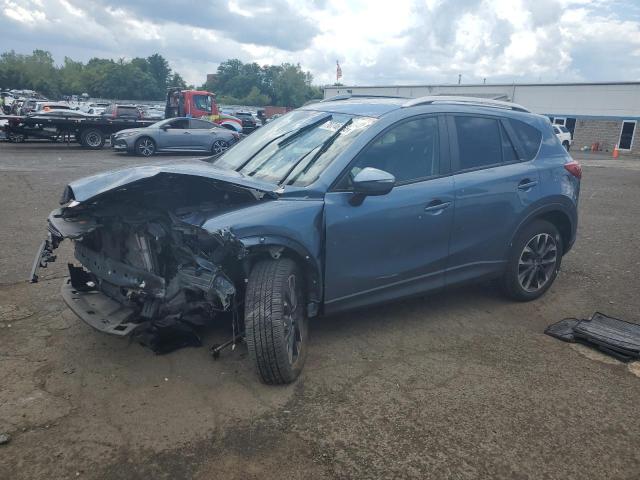 MAZDA CX-5 GT 2016 with VIN JM3KE4DY4G0711705 - Photo from auction
