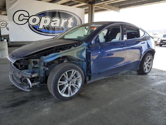 TESLA MODEL Y 2023 with VIN 7SAYGDEE7PF713115 - Photo from auction
