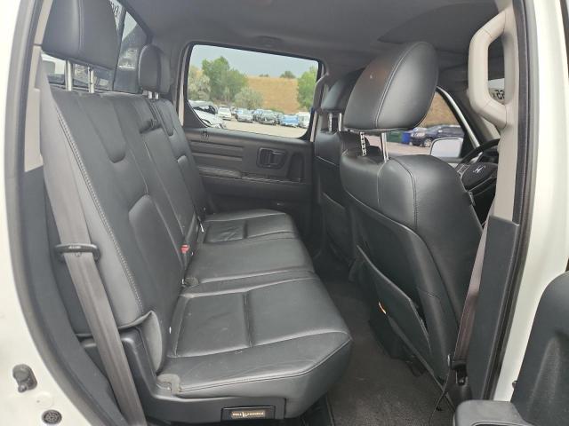 Photo 10 from auction – 2014 HONDA RIDGELINE with VIN 5FPYK1F63EB014067