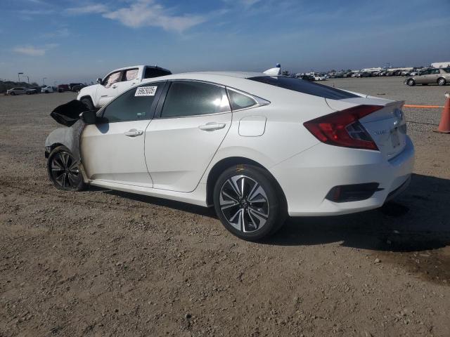 Photo 2 from auction – 2017 HONDA CIVIC EX with VIN 2HGFC1F39HH633856