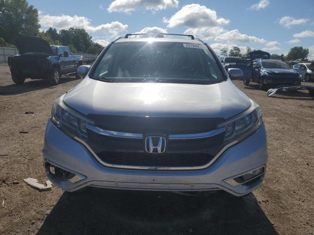 Photo 5 from auction – 2015 HONDA CR-V EXL with VIN 5J6RM4H73FL110188