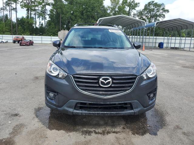 Photo 5 from auction – 2016 MAZDA CX-5 TOURI with VIN JM3KE2CY5G0868973