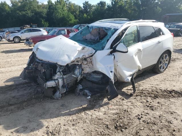 CADILLAC SRX PERFOR 2012 with VIN 3GYFNEE38CS609579 - Photo from auction