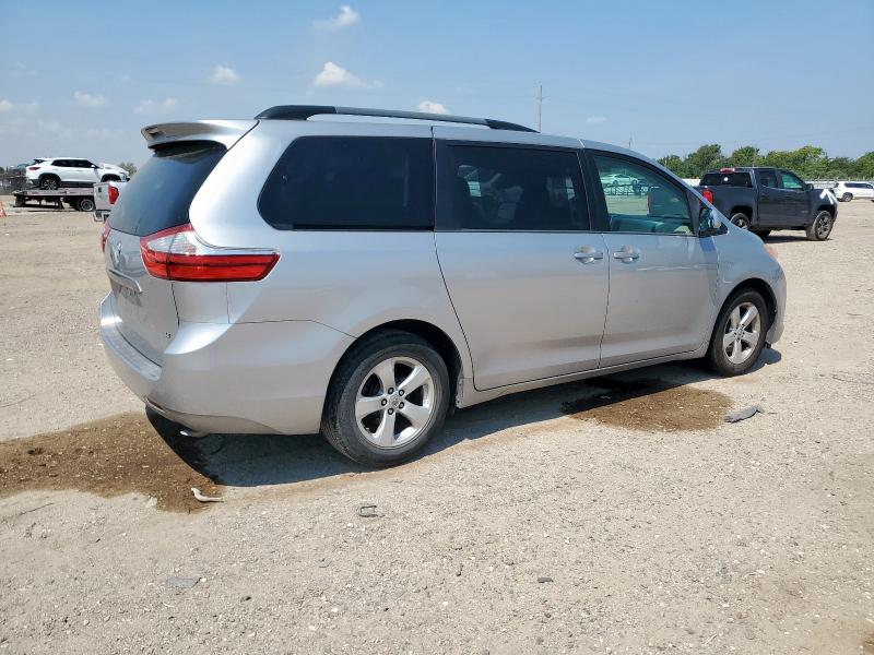 Photo 3 from auction – 2015 TOYOTA SIENNA LE with VIN 5TDKK3DCXFS593073