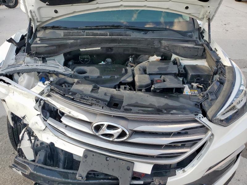 Photo 12 from auction – 2018 HYUNDAI SANTA FE S with VIN 5NMZU3LB9JH059320