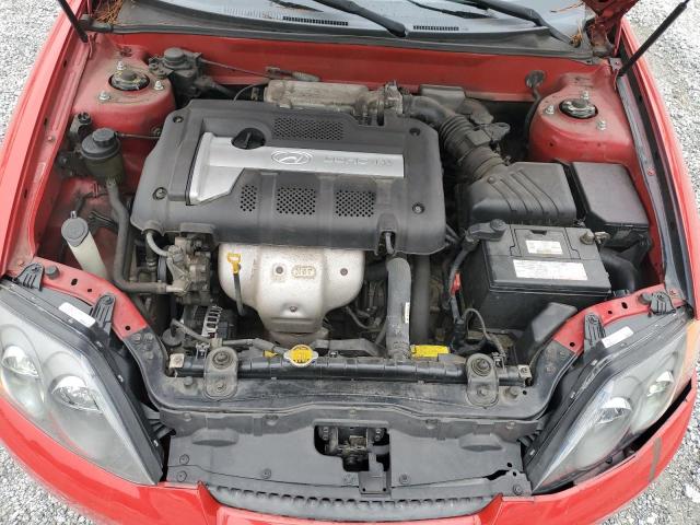 Photo 11 from auction – 2004 HYUNDAI TIBURON with VIN KMHHM65D34U139958