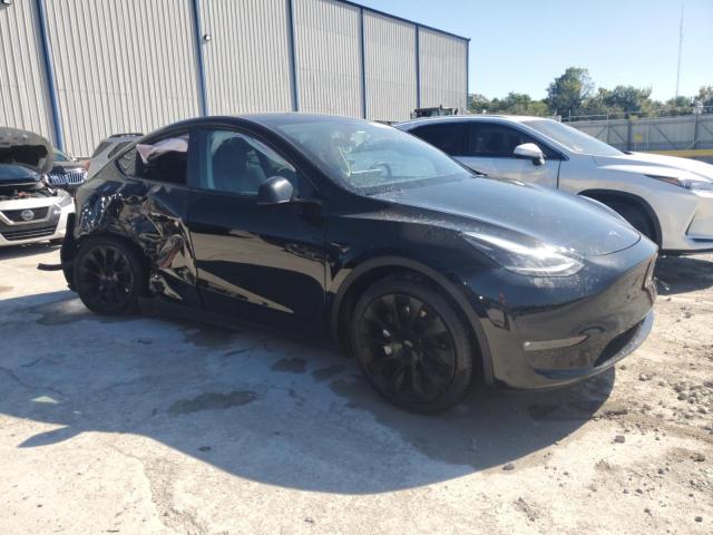 Photo 4 from auction – 2023 TESLA MODEL Y with VIN 7SAYGAEE9PF715026