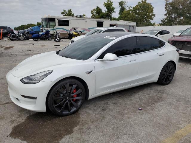 TESLA MODEL 3 2020 with VIN 5YJ3E1EC7LF719582 - Photo from auction