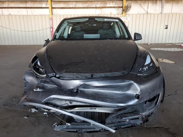 Photo 5 from auction – 2023 TESLA MODEL Y with VIN 7SAYGDEE0PF921059