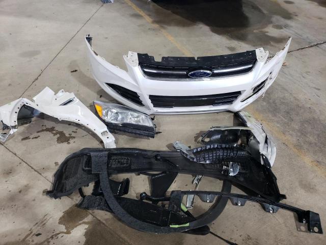 Photo 13 from auction – 2014 FORD ESCAPE TIT with VIN 1FMCU9JX8EUB21663