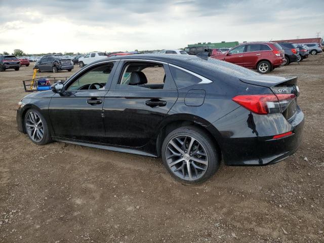 Photo 2 from auction – 2023 HONDA CIVIC TOURING with VIN 2HGFE1F92PH309757