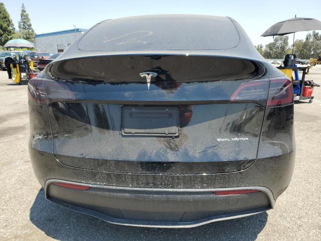 Photo 6 from auction – 2023 TESLA MODEL Y with VIN 7SAYGAEE3PF843052