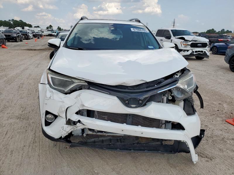 Photo 5 from auction – 2017 TOYOTA RAV4 XLE with VIN JTMWFREV8HD107688