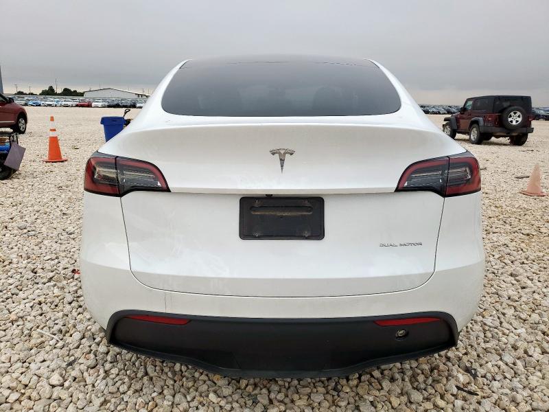 Photo 6 from auction – 2023 TESLA MODEL Y with VIN 7SAYGDEE0PA116370