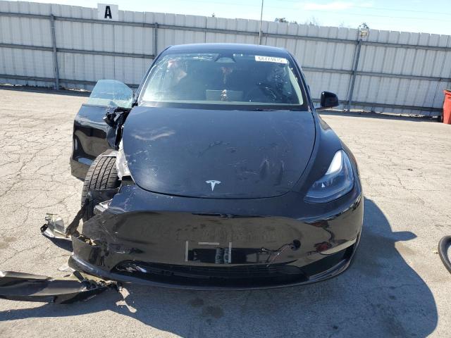 Photo 5 from auction – 2023 TESLA MODEL Y with VIN 7SAYGAEE3PF903721