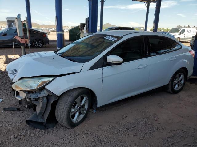 FORD FOCUS SE 2014 with VIN 1FADP3F22EL453801 - Photo from auction