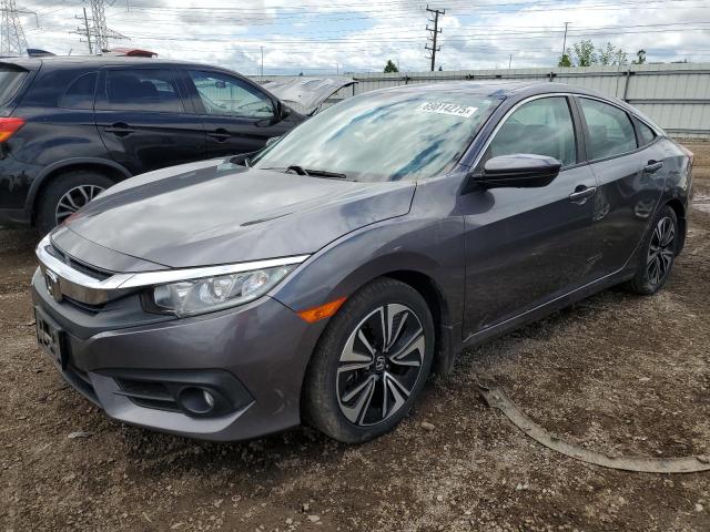 HONDA CIVIC EX 2017 with VIN 19XFC1E30HE023002 - Photo from auction