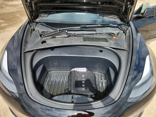 Photo 11 from auction – 2022 TESLA MODEL 3 with VIN 5YJ3E1EB8NF336972