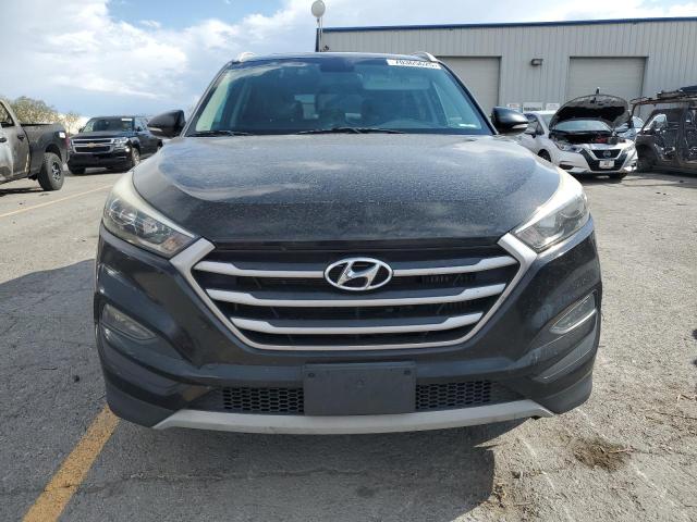 Photo 5 from auction – 2017 HYUNDAI TUCSON LIM with VIN KM8J3CA27HU315620