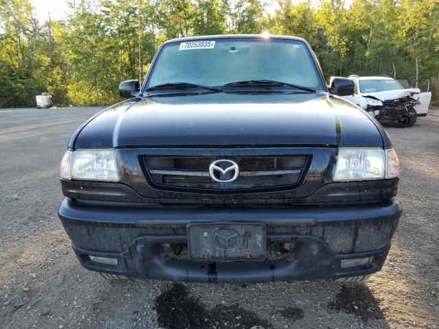 Photo 5 from auction – 2004 MAZDA B3000 CAB with VIN 4F4YR46U74TM09022