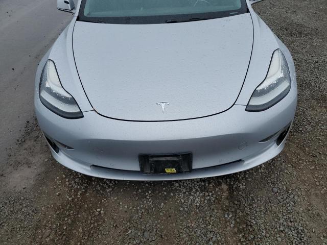 Photo 11 from auction – 2018 TESLA MODEL 3 with VIN 5YJ3E1EA8JF039461