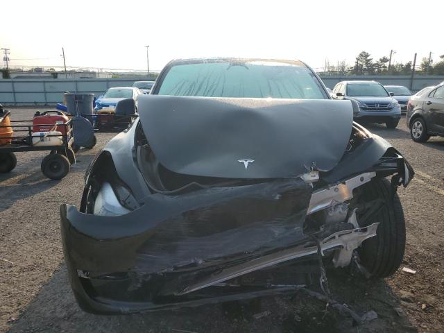Photo 5 from auction – 2022 TESLA MODEL Y with VIN 7SAYGDEF0NF521167