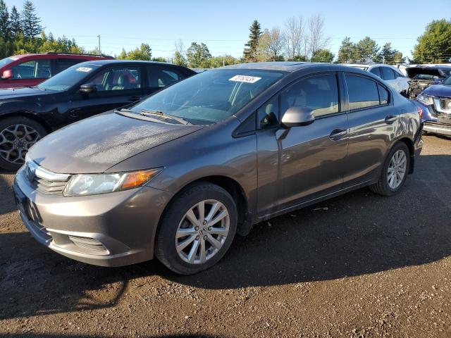 HONDA CIVIC LX 2012 with VIN 2HGFB2F59CH021384 - Photo from auction