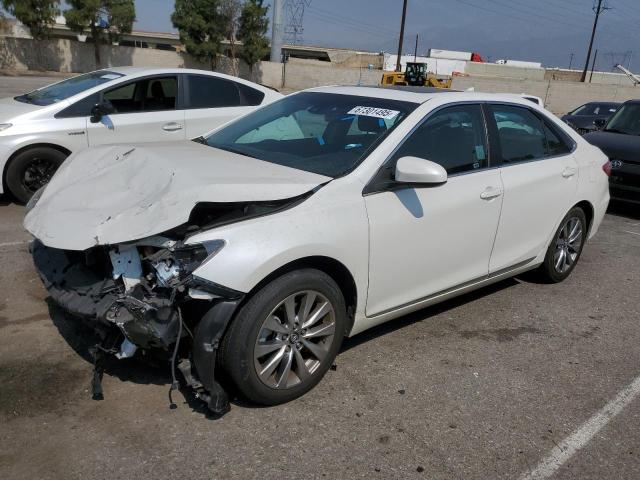 TOYOTA CAMRY LE 2017 with VIN 4T1BF1FK9HU647387 - Photo from auction