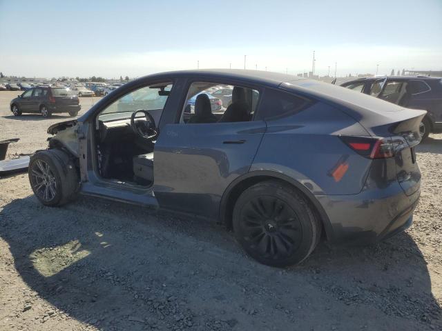 Photo 2 from auction – 2023 TESLA MODEL Y with VIN 7SAYGAEE4PF744787