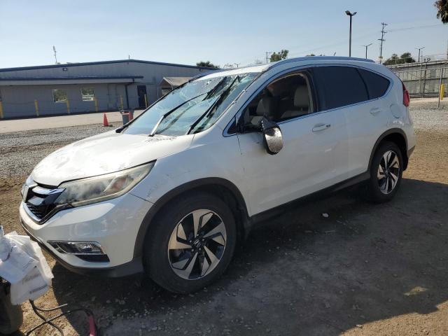 HONDA CR-V TOURI 2015 with VIN 5J6RM3H90FL021562 - Photo from auction