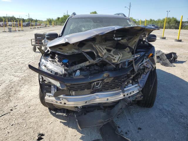 Photo 5 from auction – 2021 HONDA PASSPORT E with VIN 5FNYF8H06MB026954