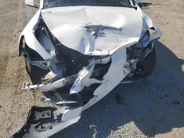Photo 12 from auction – 2020 TESLA MODEL Y with VIN 5YJYGDEE0LF015663