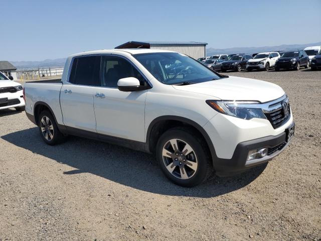 Photo 4 from auction – 2019 HONDA RIDGELINE with VIN 5FPYK3F73KB023416