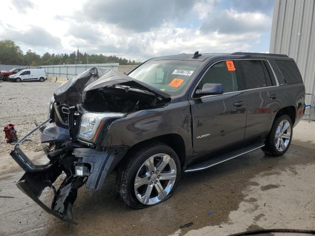 GMC YUKON SLE 2016 with VIN 1GKS2AKC1GR334841 - Photo from auction
