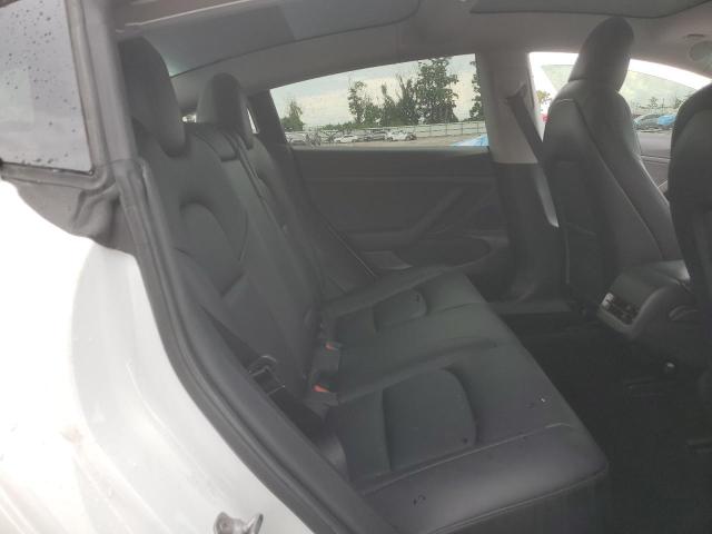 Photo 10 from auction – 2021 TESLA MODEL 3 with VIN 5YJ3E1EA8MF857860
