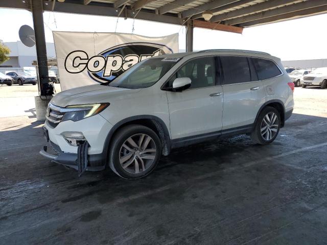 Photo 1 from auction – 2017 HONDA PILOT TOUR with VIN 5FNYF6H95HB061946
