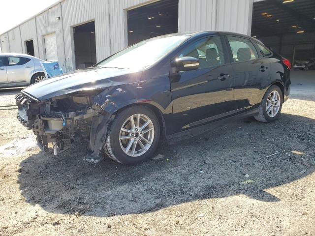 FORD FOCUS SE 2016 with VIN 1FADP3F29GL285707 - Photo from auction