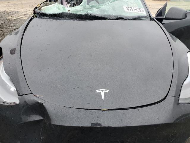 Photo 12 from auction – 2024 TESLA MODEL Y with VIN 7SAYGDEE3RA245075