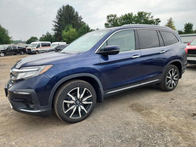 HONDA PILOT TOUR 2022 with VIN 5FNYF6H92NB037454 - Photo from auction