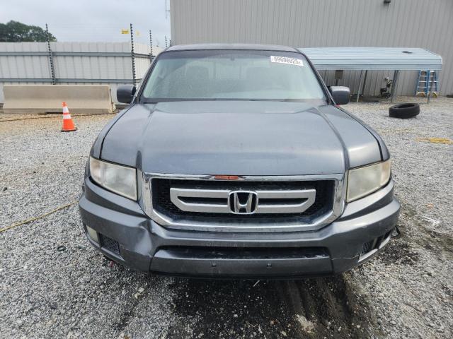 Photo 5 from auction – 2011 HONDA RIDGELINE with VIN 5FPYK1F48BB005181