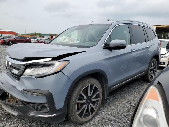 Photo 1 from auction – 2022 HONDA PILOT TOUR with VIN 5FNYF6H66NB506549