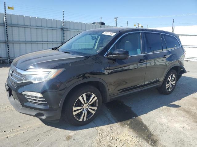 HONDA PILOT EXL 2016 with VIN 5FNYF5H56GB041761 - Photo from auction